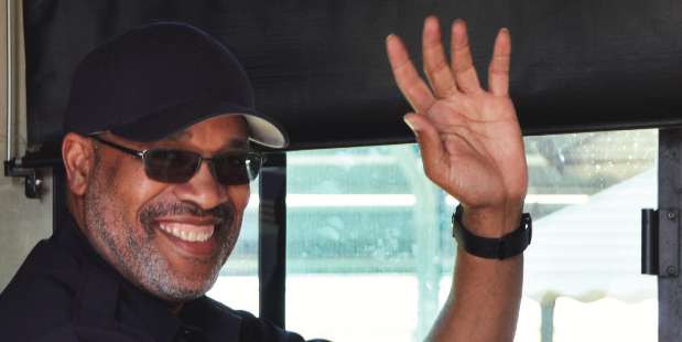 Smile and Wave- Quintin Webster, TARC bus driver, waves at entering passengers on May 11. Hes been a bus driver for six years and says he loves what he does day after day. Photo by Mia Breitenstein