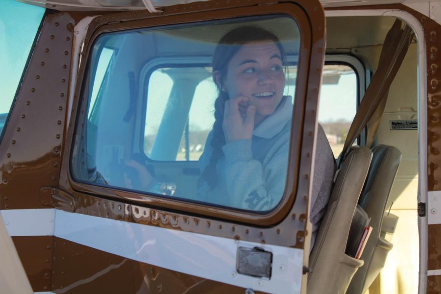 Pilots Seat 
At Bowman Field, Charlotte McCarthy, age 18, glances back to explain the controls of ‘Brown Bear’, one of Flight Clubs Cessna 150 planes on March 14. 