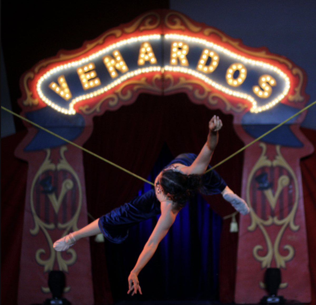 Fine Line- Performer balances on a tight rope at Venardos Circus. Photo by Erica Fields.