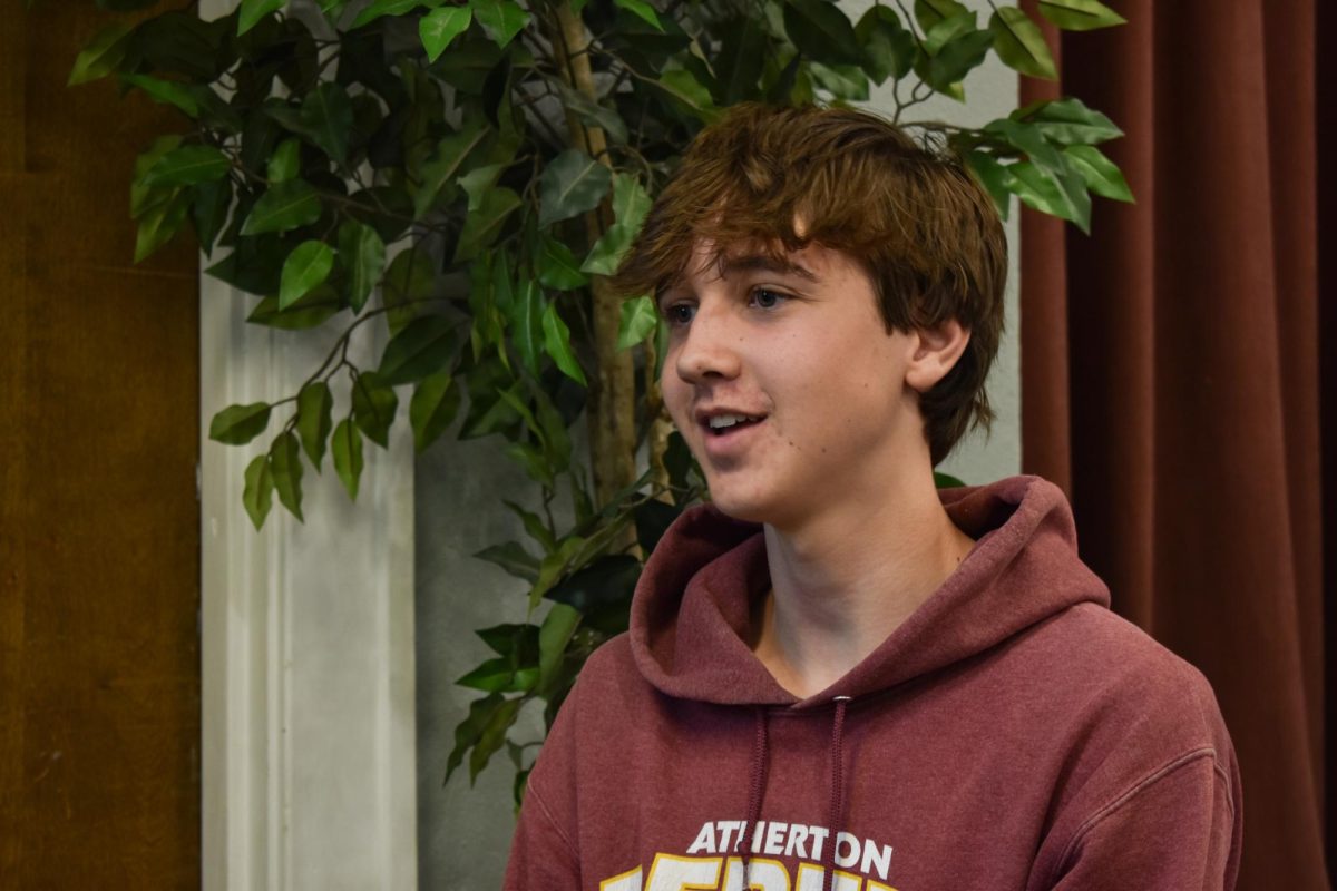 Discussing the Divide - Wesley Buchanan, 16, defines redlining at the St. Paul United Methodist Church on Oct. 27. He highlights that, while this process is illegal, its effects are still present in Louisville.