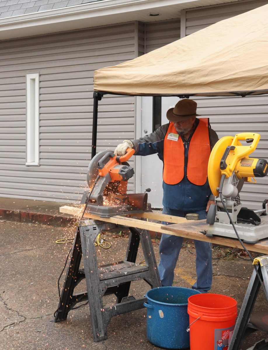 Sparks - Blacksmith Craig Kaviar dismantles a gun brought to the Guns to Gardens safe-surrender event on Nov. 11. Each gun is deconstructed immediately at the event.