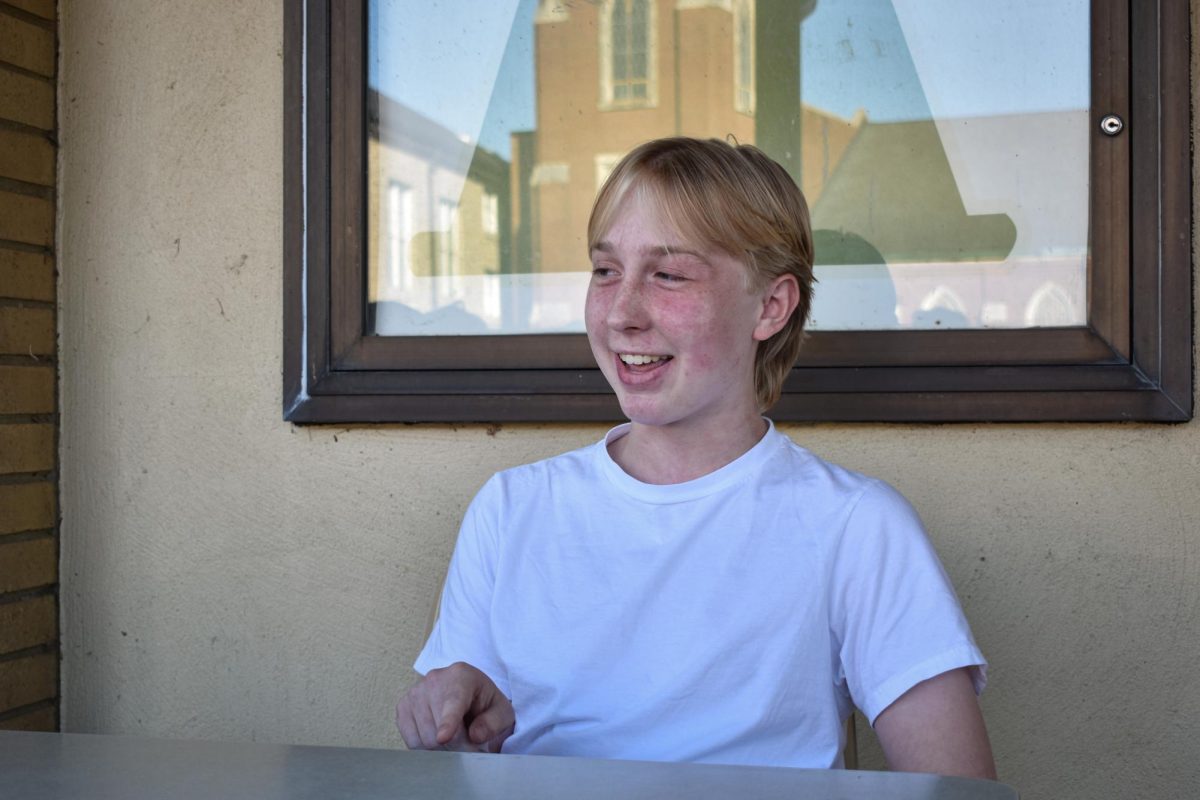 Lights, Camera, Action!: Jesse Raymond, 17, a senior at Ballard High School, describes his journey of self-discovery through filmmaking at Sunergos Coffee on Sept. 8. Raymond produces short films within the community. Photo by Loren Williamson